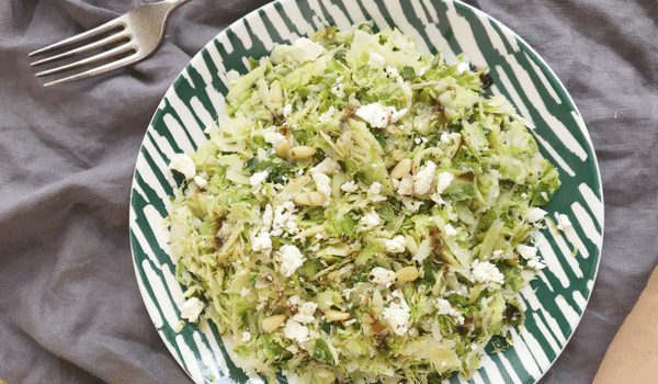 Shaved Brussel Sprouts Salad with Pine Nuts & Feta
